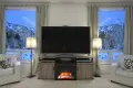 Carson Transitional Distressed Gray Oak Electric Fireplace TV Console