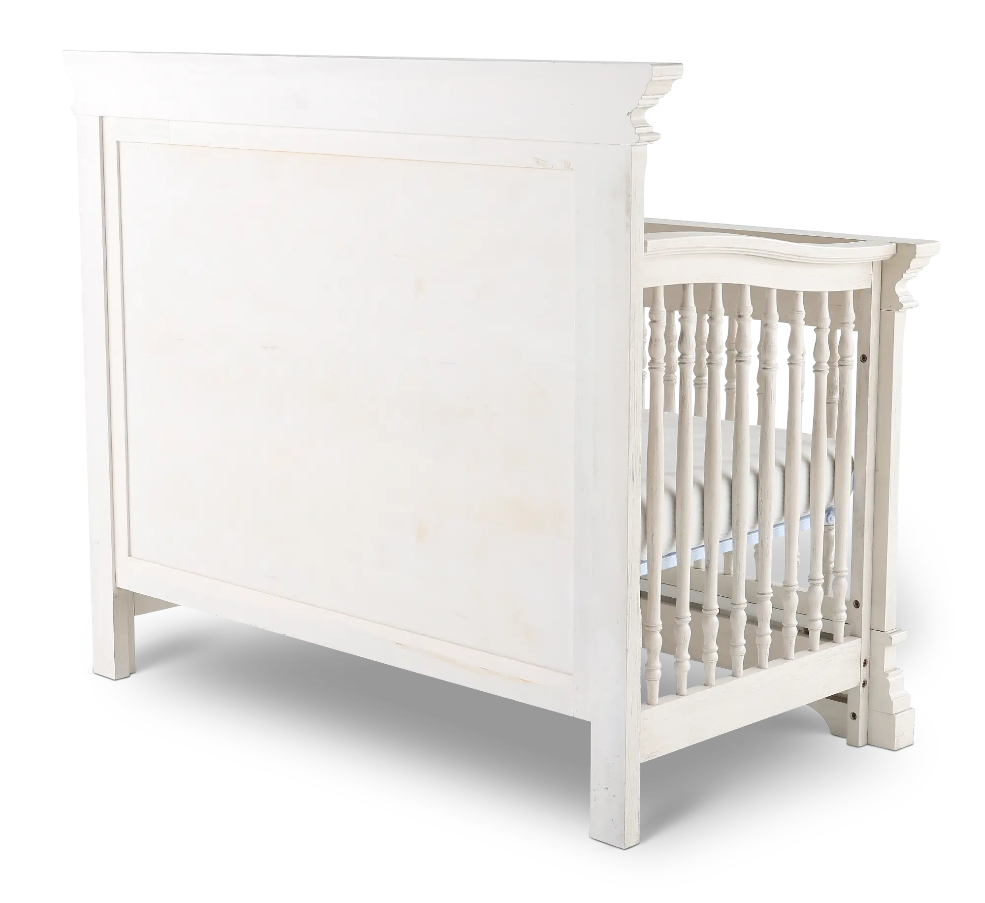 Full view of white crib with side rails and headboard