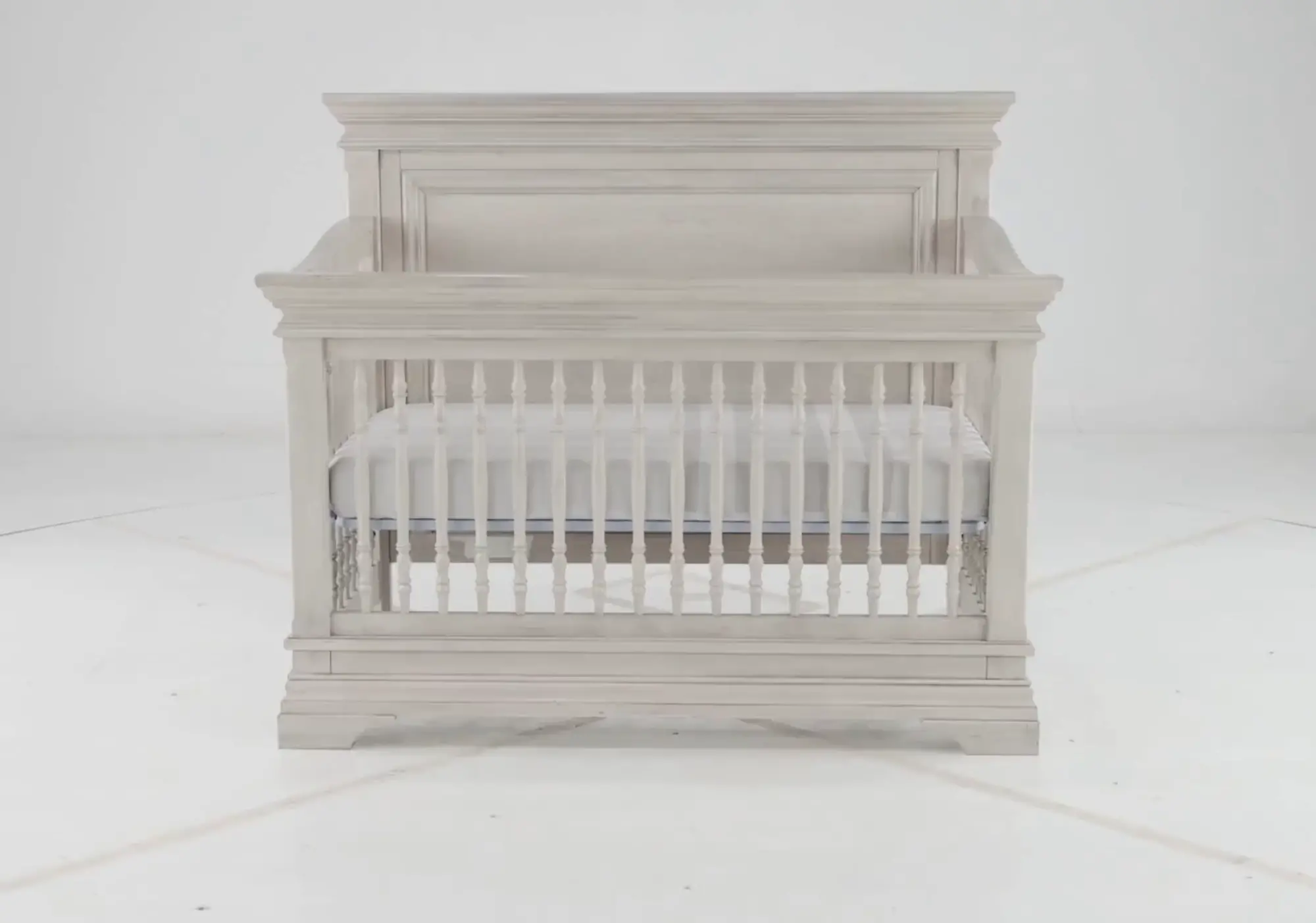 Close-up of crib slats and mattress base