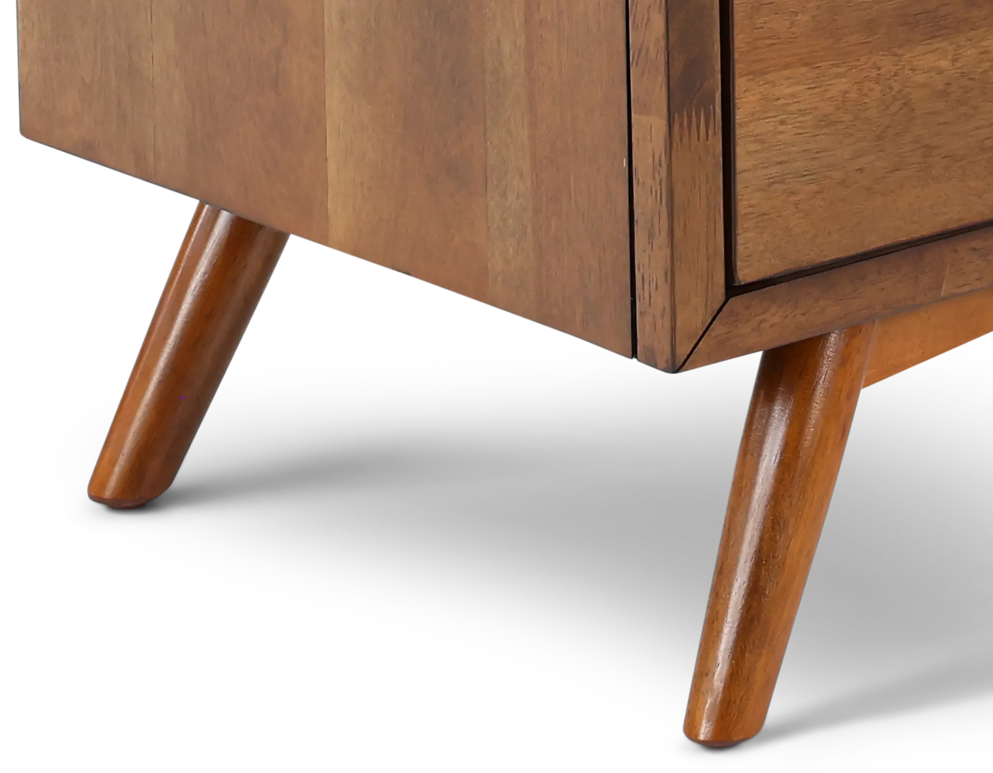 Close-up of wood grain on nightstand surface