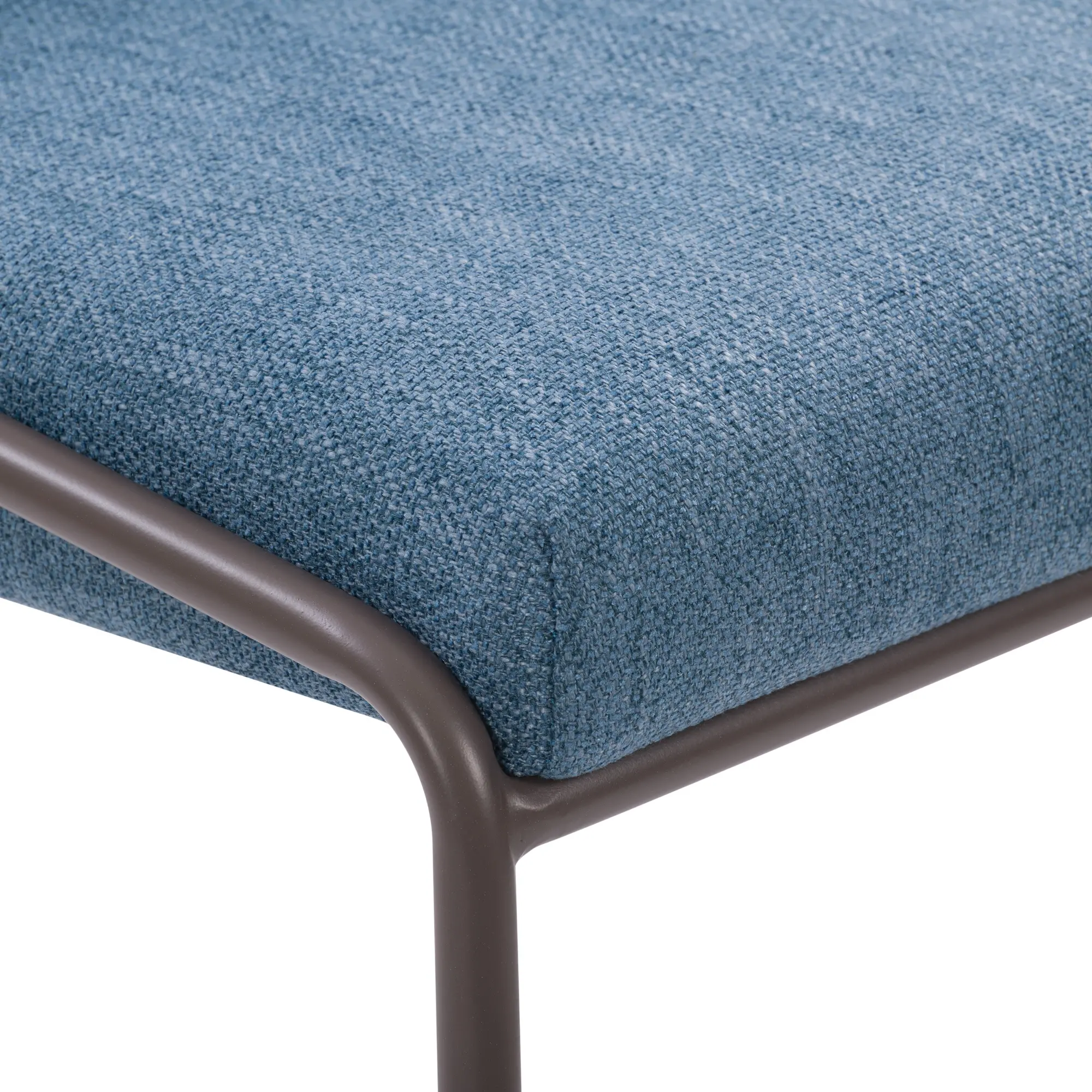 Close-up of blue fabric upholstery on bar stool seat