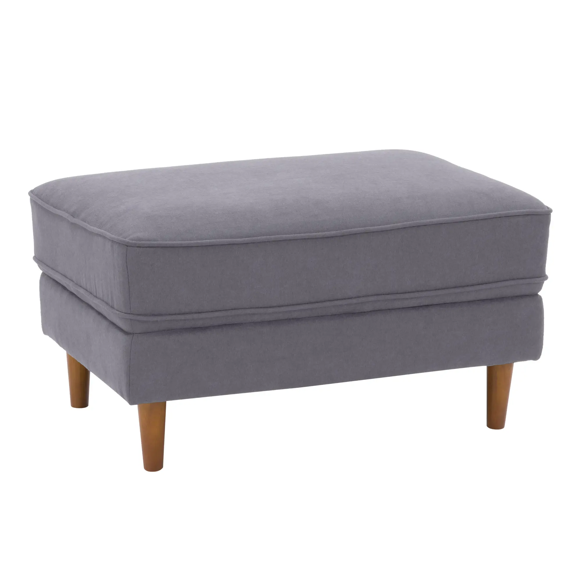 Close-up of the ottoman corner showing fabric and seam