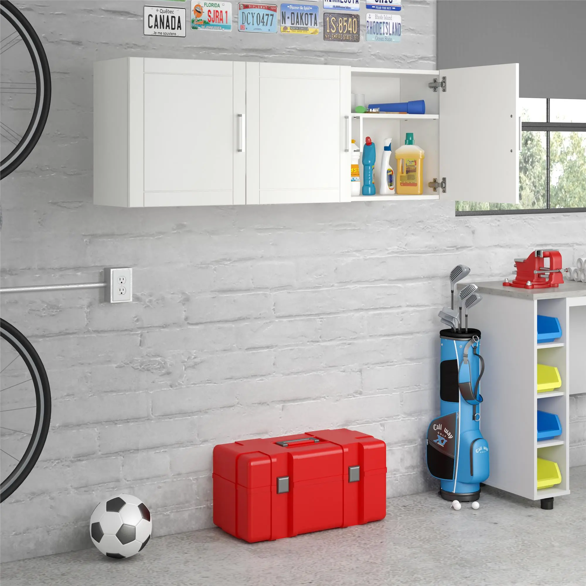 Open white wall cabinet with interior shelving containing cleaning supplies and bottles.