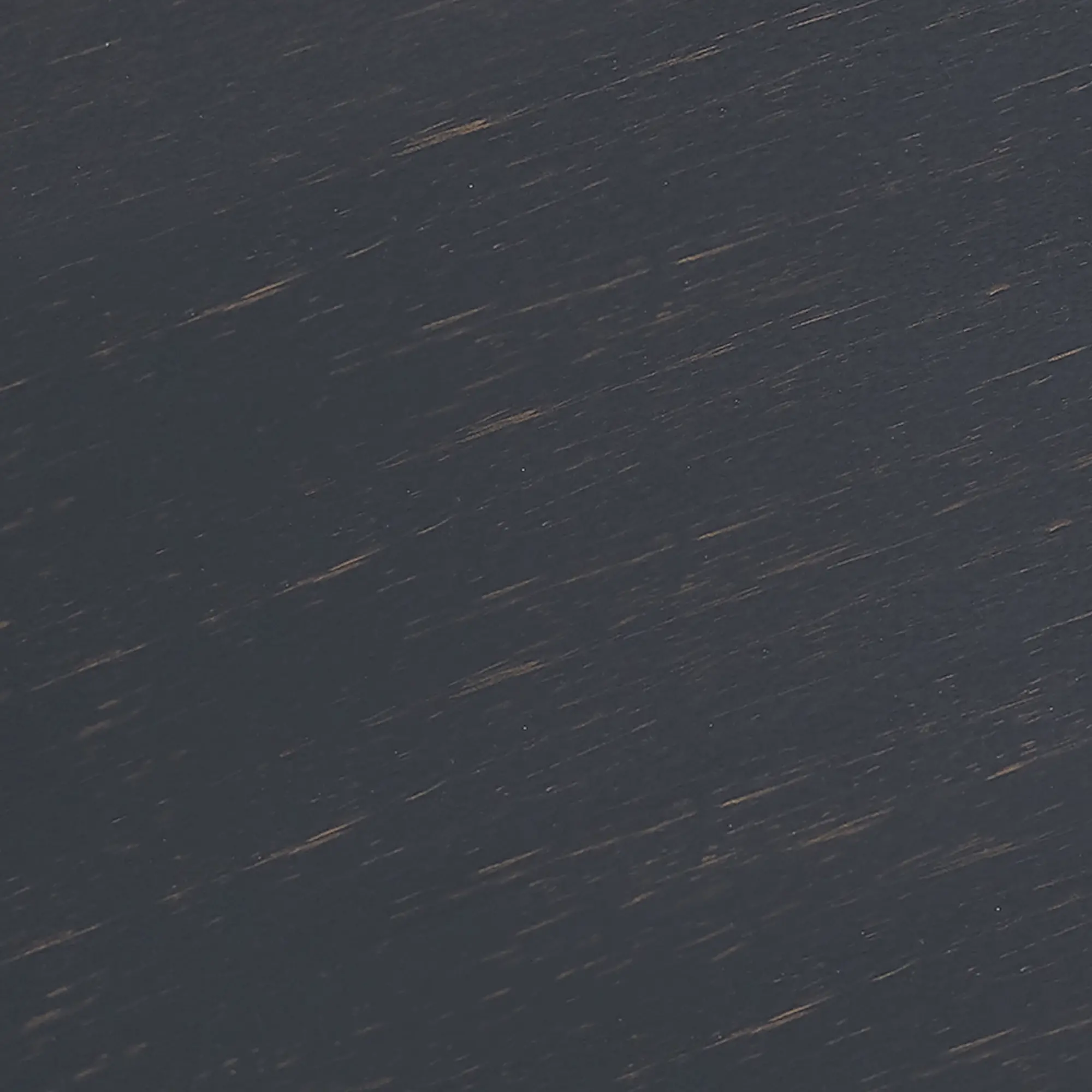 Close-up of dark wood grain/finishing on surface, color appears dark grayish walnut.