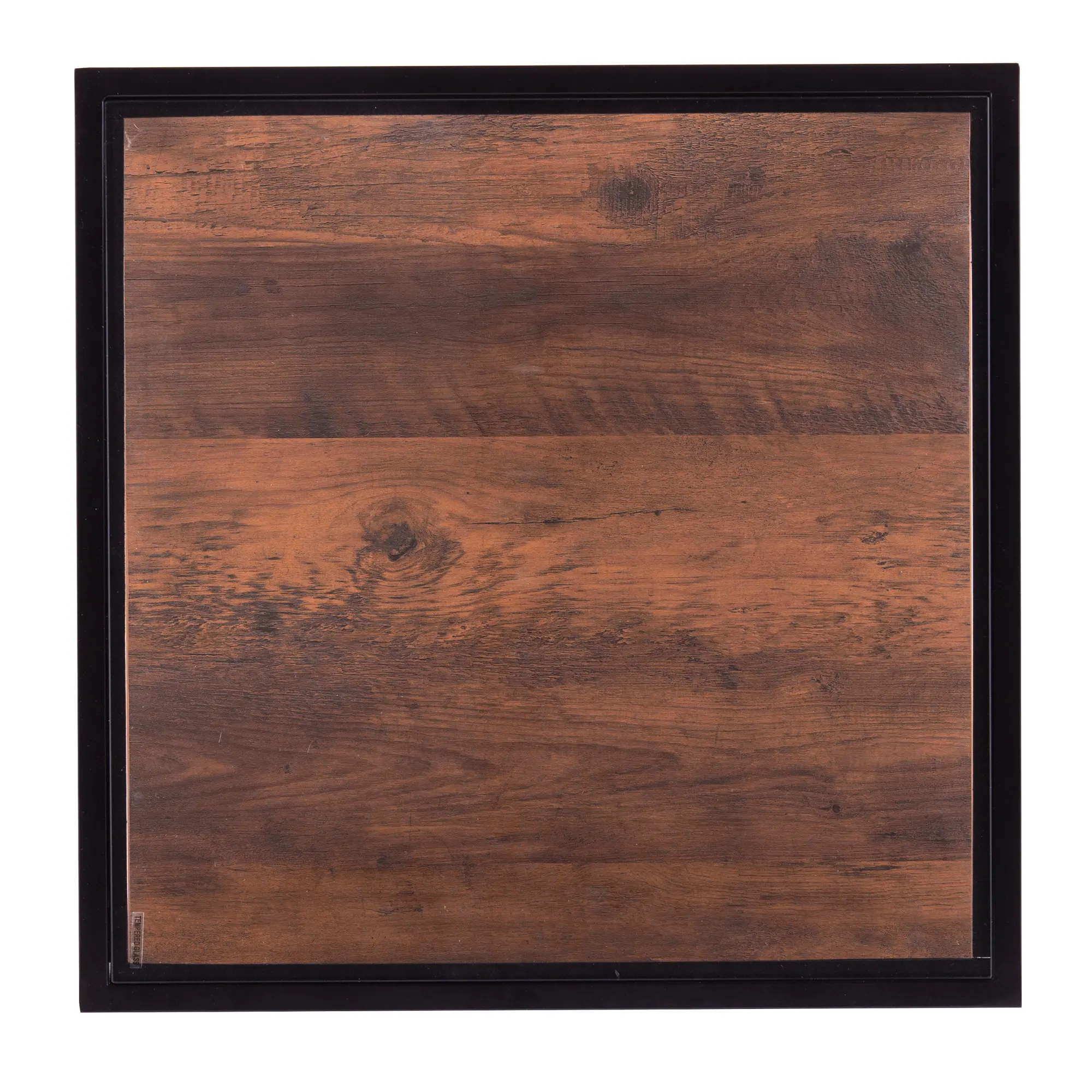 Top-down view of a wooden panel in a black frame.