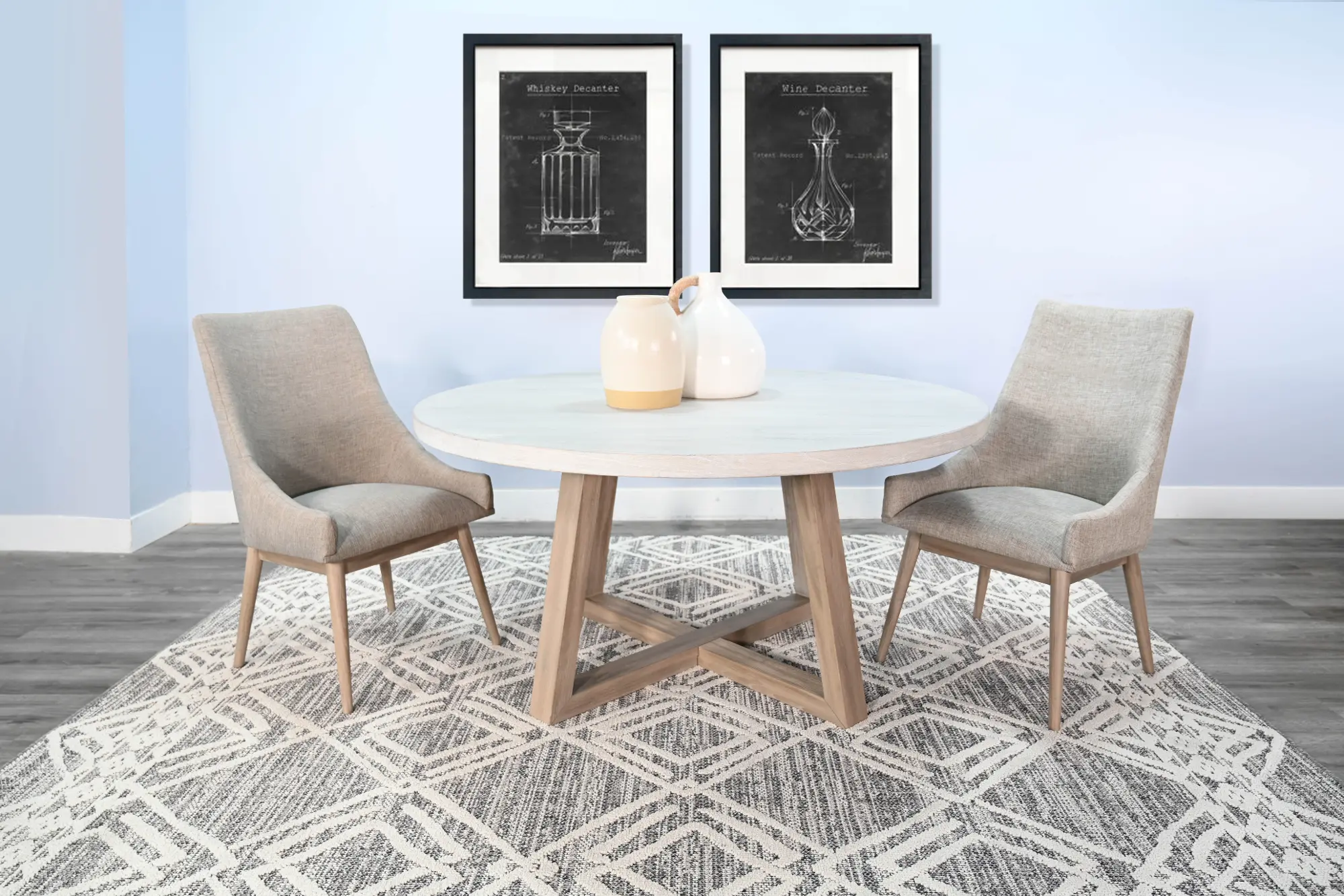 Round dining table with light wood legs and grey top