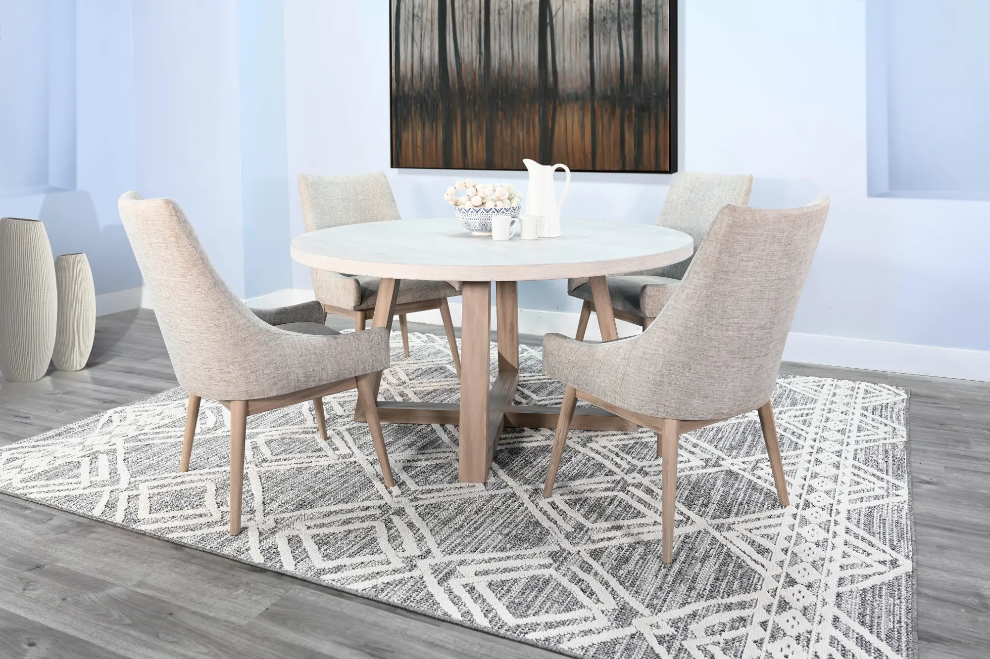 Six chair dining set with circular table and decor, in bright room