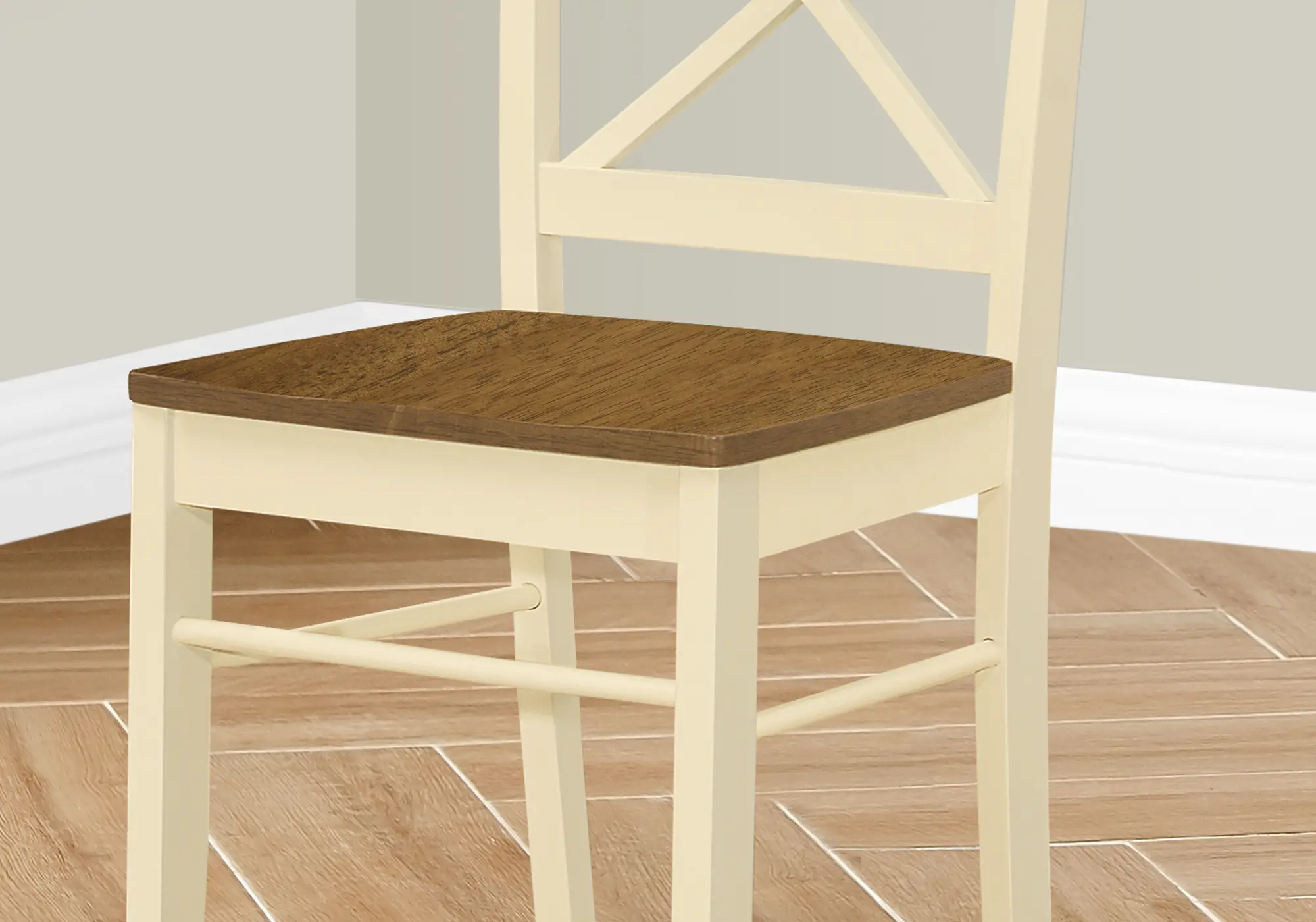 Close-up of chair seat and backrest showing wood grain and joinery.
