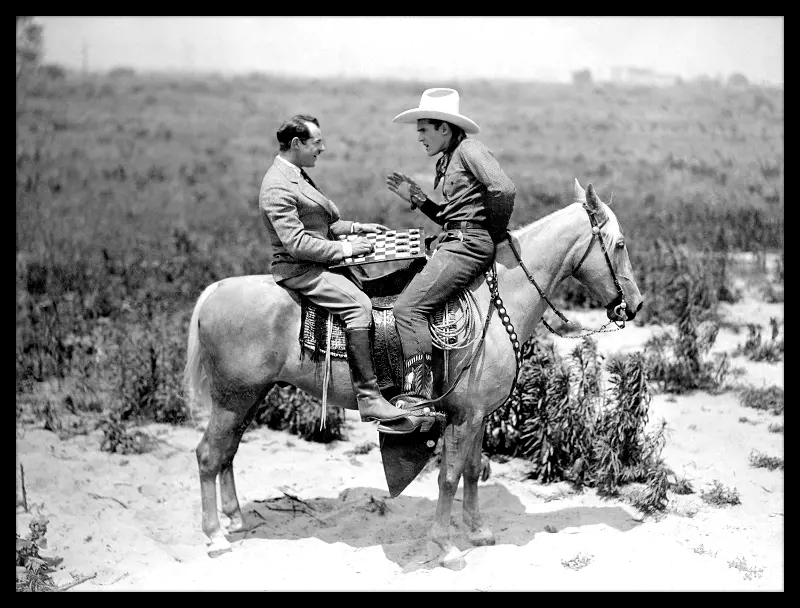 Cowboy Playing Chess Framed Art