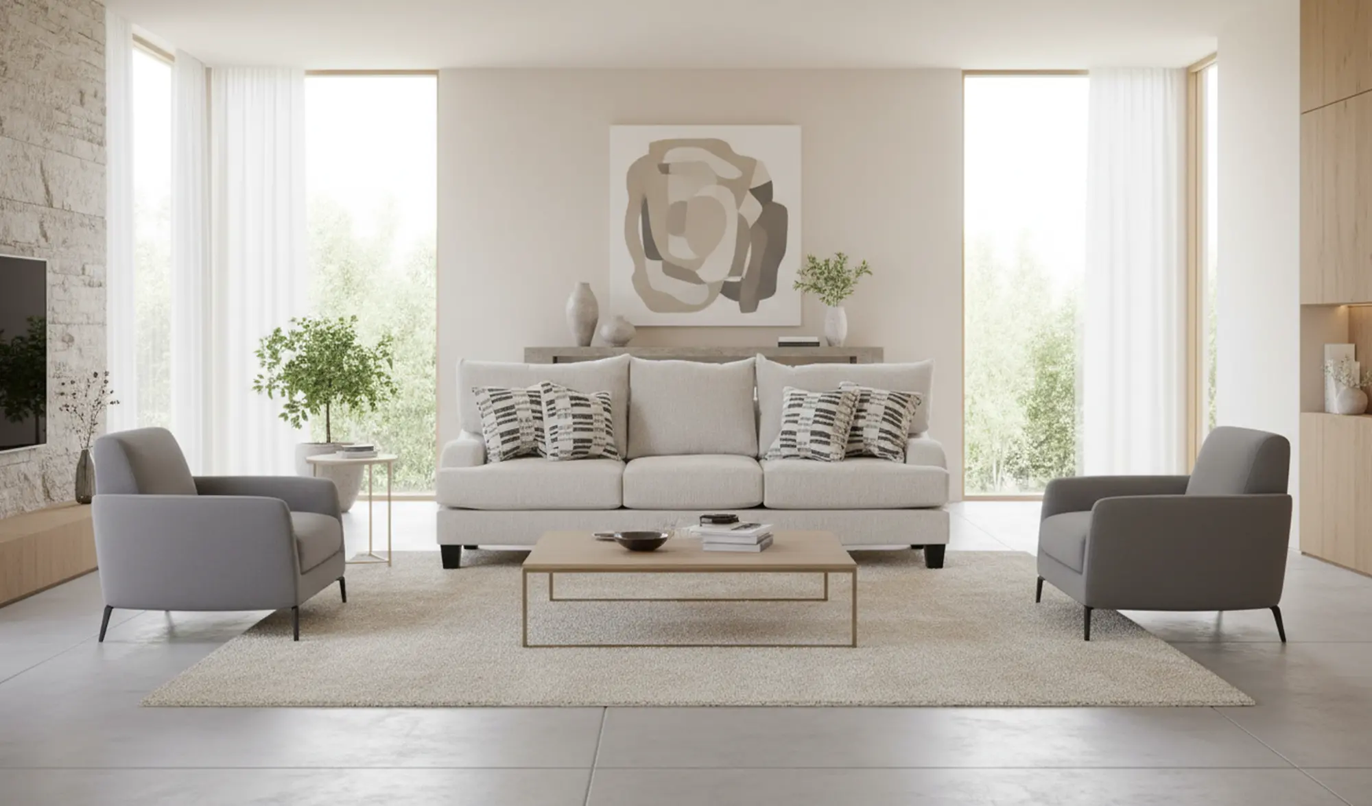 Studio shot of light beige couch with three seat sections and patterned pillows